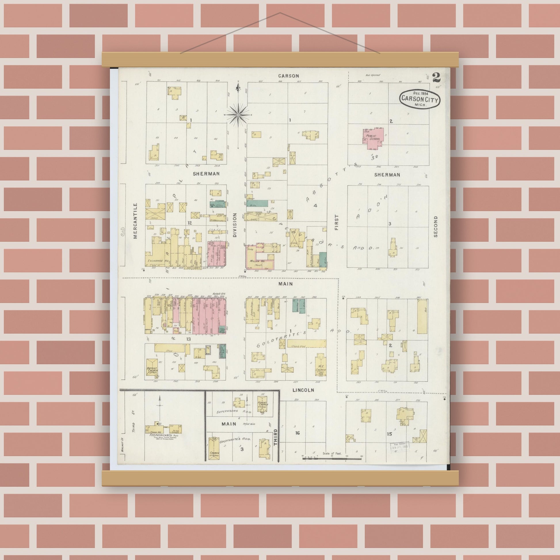 Old map wall art mockup — magnetic wood frame on brick wall — Sanborn Fire Insurance Map from Carson City, Montcalm County, Michigan (1894), Sheet #0002