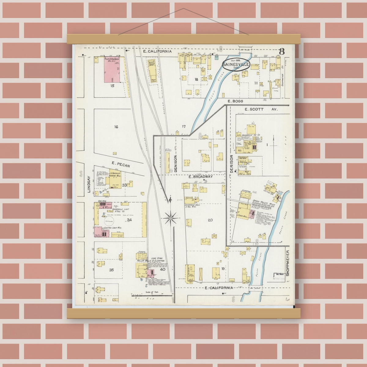 Old map wall art mockup — magnetic wood frame on brick wall — Sanborn Fire Insurance Map from Gainesville, Cooke County, Texas (1892), Sheet #0008