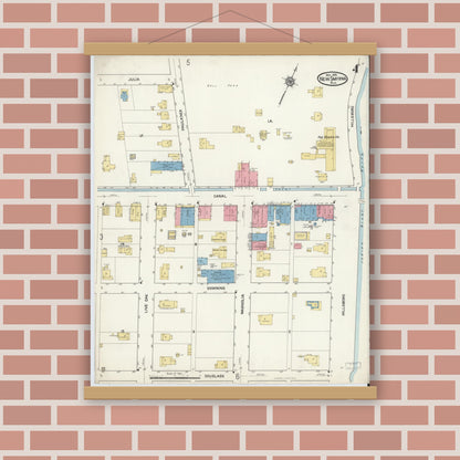 Old map wall art mockup — magnetic wood frame on brick wall — Sanborn Fire Insurance Map from New Smyrna, Valusia County, Florida (1916), Sheet #0004