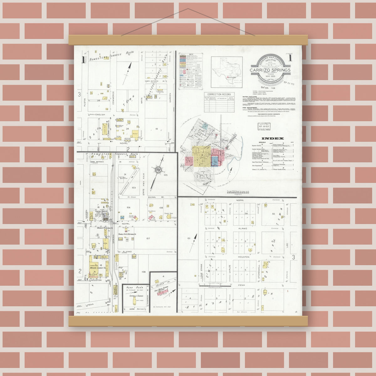 Old map wall art mockup — magnetic wood frame on brick wall — Sanborn Fire Insurance Map from Carrizo Springs, Dimmit County, Texas (1933) - Complete Map Set