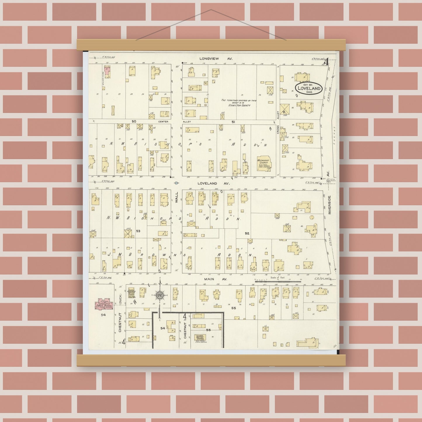 Old map wall art mockup — magnetic wood frame on brick wall — Sanborn Fire Insurance Map from Loveland, Clermont, Hamilton, And Warren County, Ohio (1911), Sheet #0004