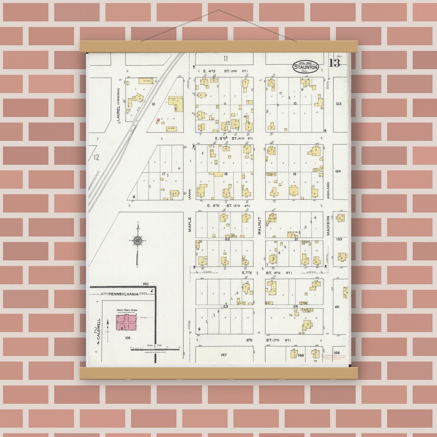 Old map wall art mockup — magnetic wood frame on brick wall — Sanborn Fire Insurance Map from Staunton, Macoupin County, Illinois (1921), Sheet #0013
