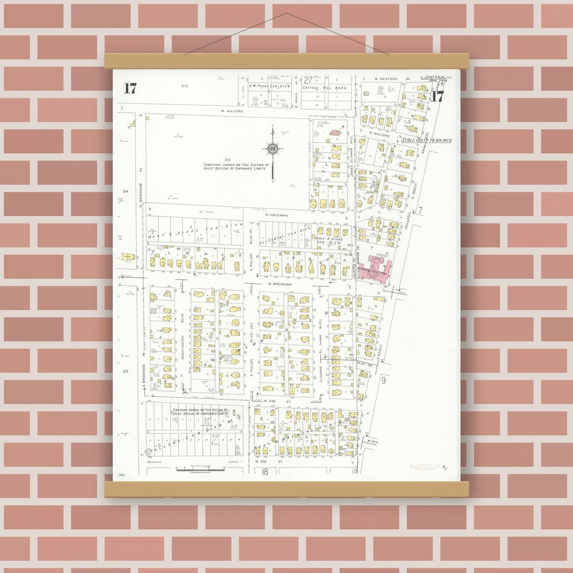 Old map wall art mockup — magnetic wood frame on brick wall — Sanborn Fire Insurance Map from Centralia, Marion, Clinton, Jefferson, and Washington Counties, Illinois (1938), Sheet #0017
