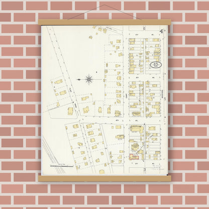 Old map wall art mockup — magnetic wood frame on brick wall — Sanborn Fire Insurance Map from Ely, Saint Louis County, Minnesota (1906), Sheet #0004