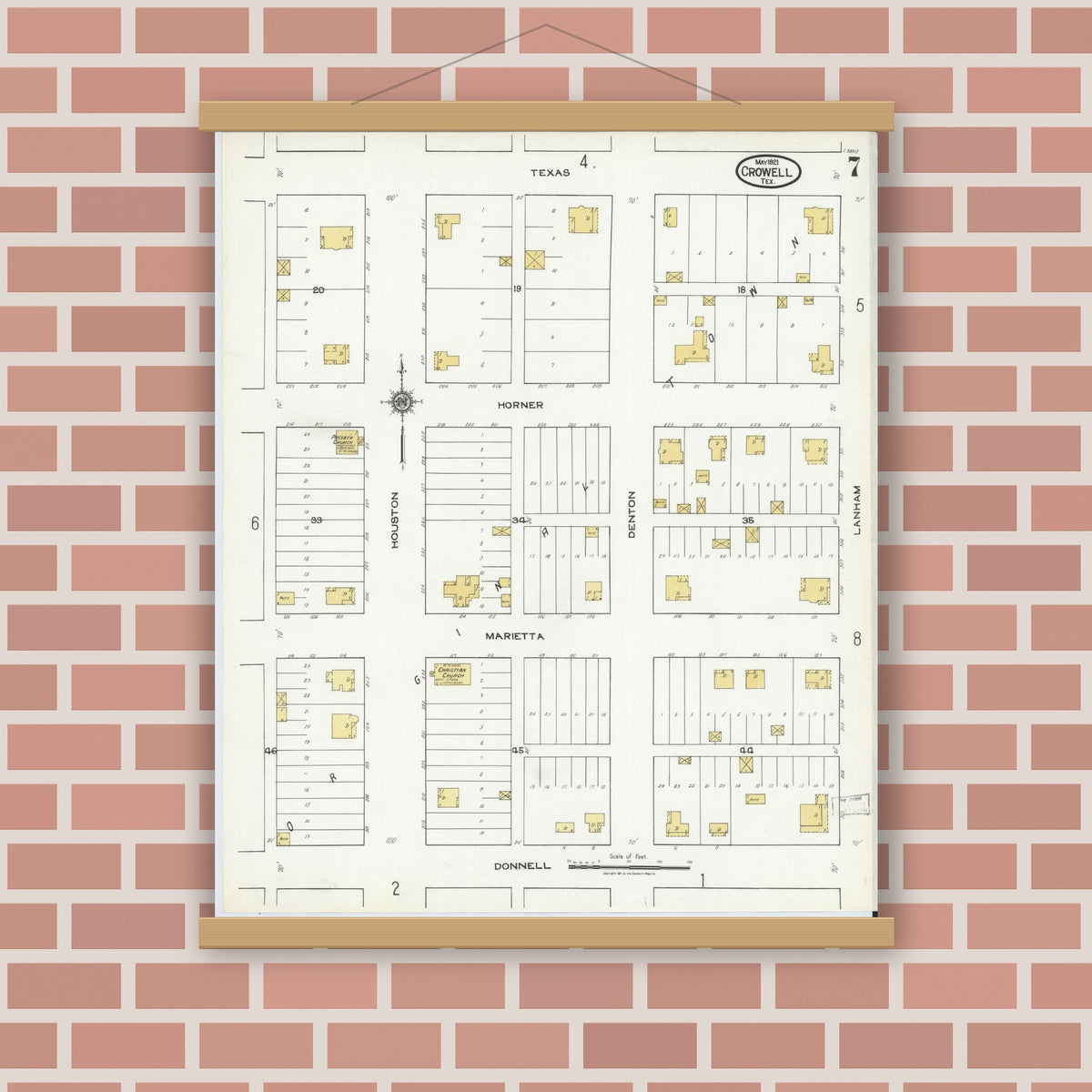 Old map wall art mockup — magnetic wood frame on brick wall — Sanborn Fire Insurance Map from Crowell, Foard County, Texas (1921), Sheet #0007