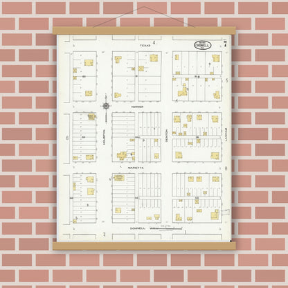 Old map wall art mockup — magnetic wood frame on brick wall — Sanborn Fire Insurance Map from Crowell, Foard County, Texas (1921), Sheet #0007