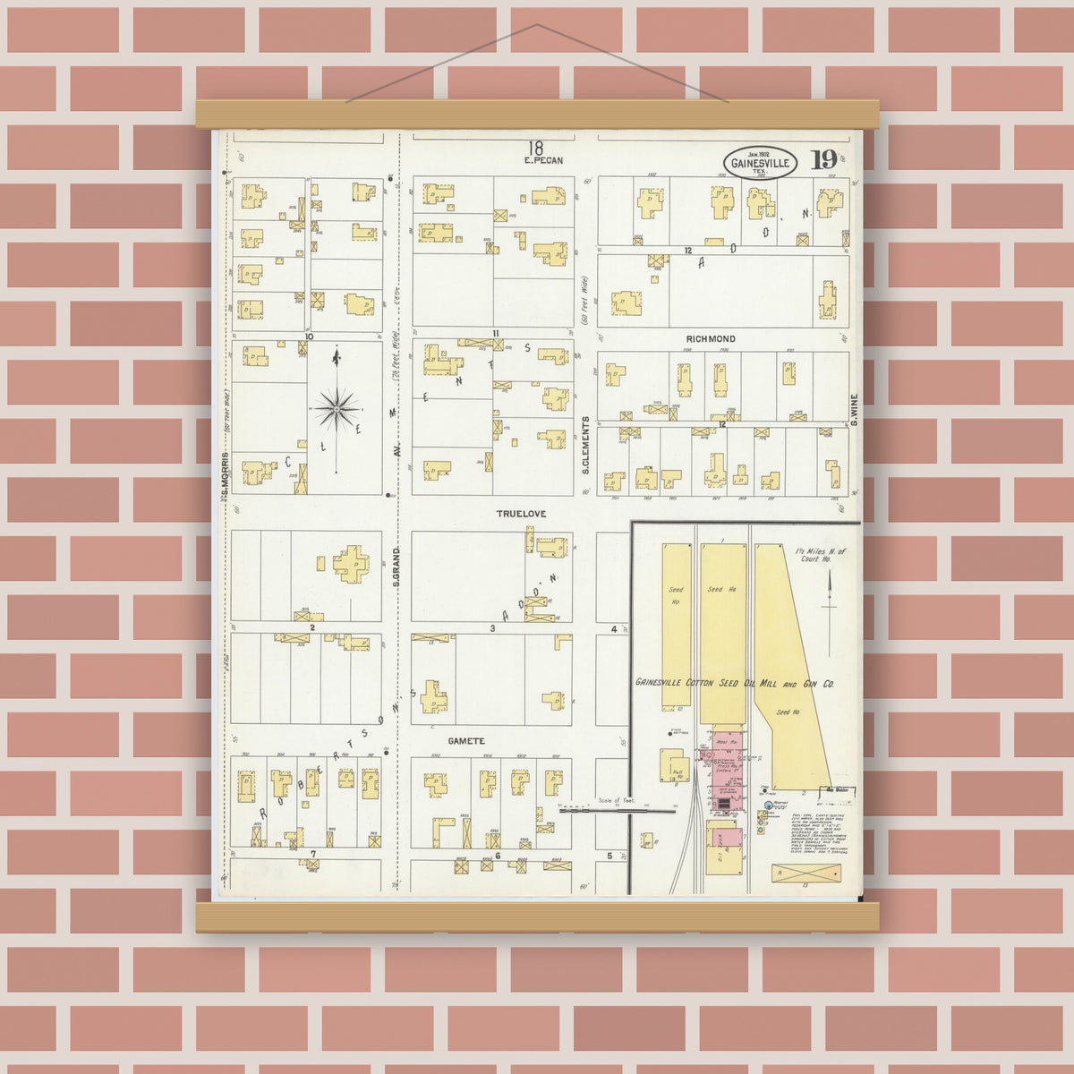 Old map wall art mockup — magnetic wood frame on brick wall — Sanborn Fire Insurance Map from Gainesville, Cooke County, Texas (1902), Sheet #0019