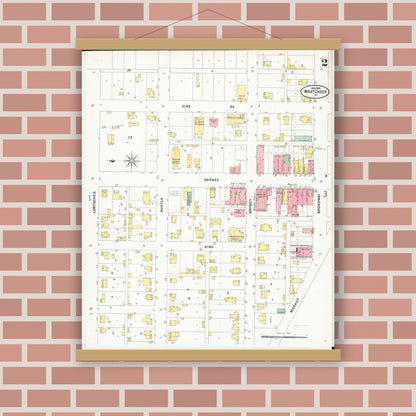 Old map wall art mockup — magnetic wood frame on brick wall — Sanborn Fire Insurance Map from What Cheer, Keokuk County, Iowa (1899), Sheet #0002