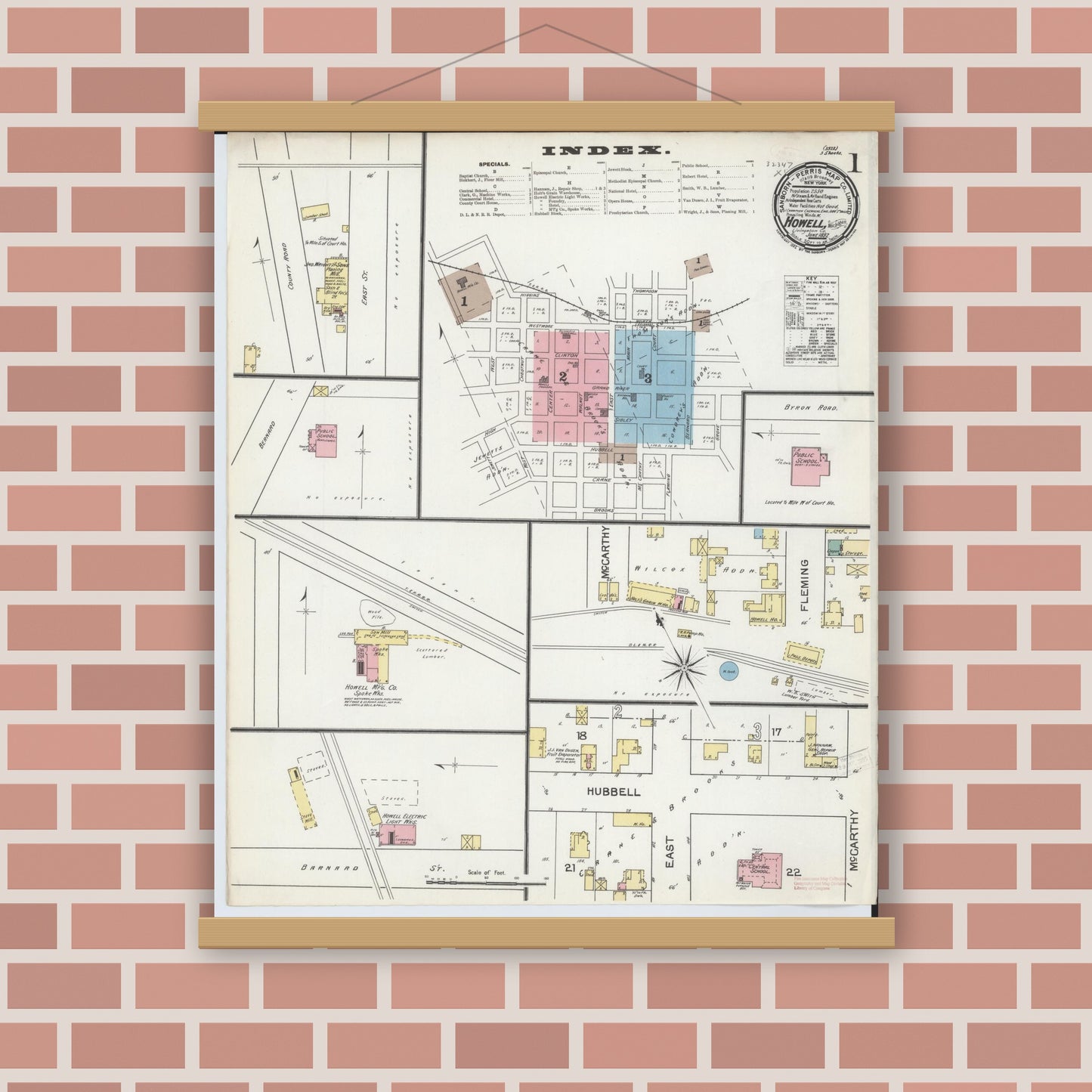 Old map wall art mockup — magnetic wood frame on brick wall — Sanborn Fire Insurance Map from Howell, Livingston County, Michigan (1892), Sheet #0001