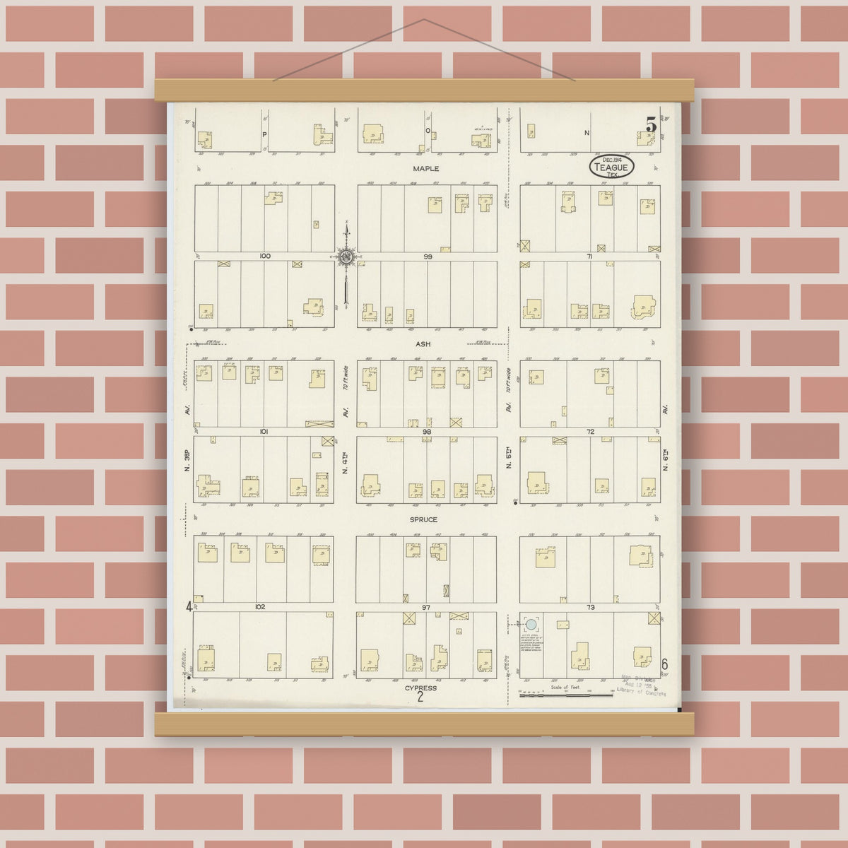 Old map wall art mockup — magnetic wood frame on brick wall — Sanborn Fire Insurance Map from Teague, Freestone County, Texas (1914), Sheet #0005