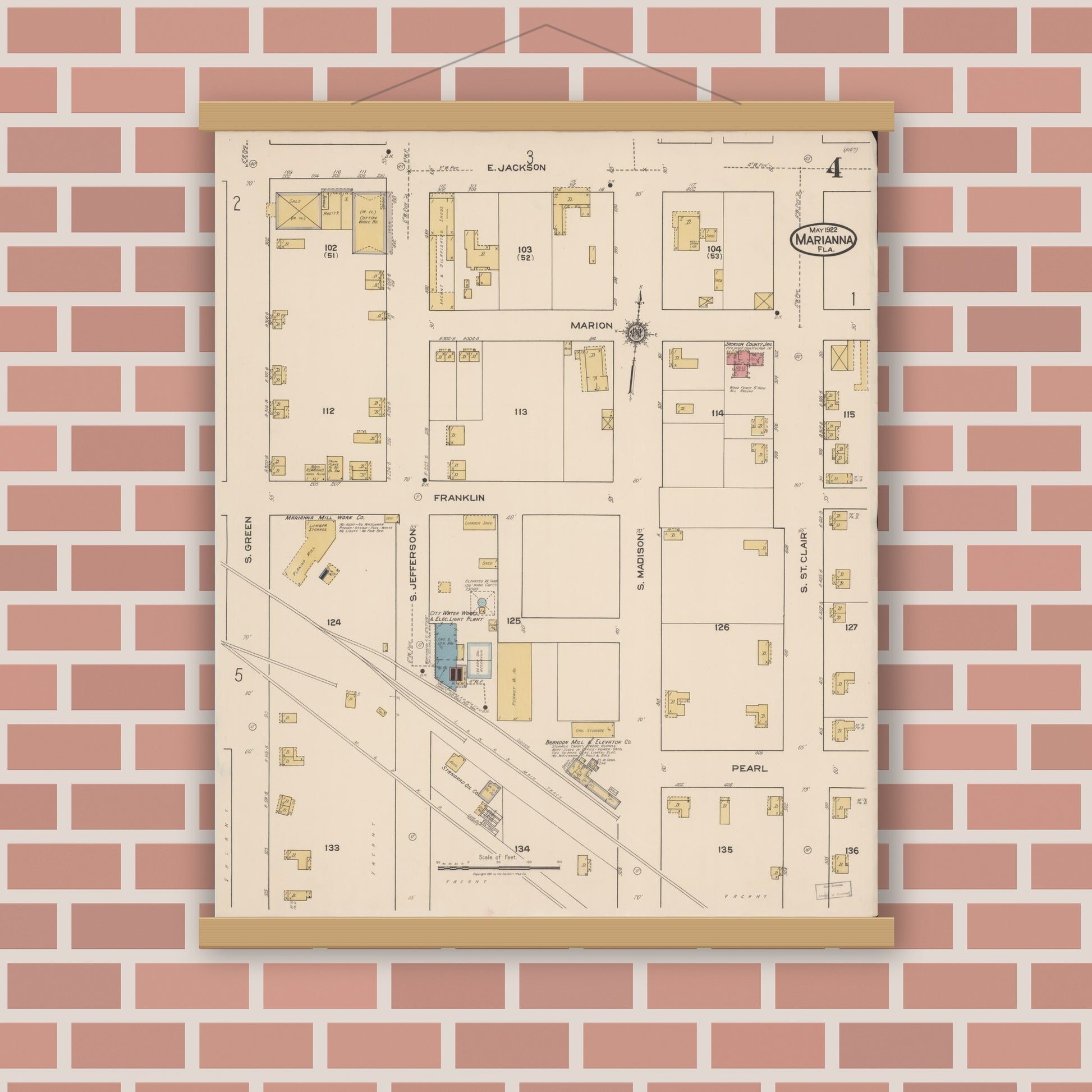 Old map wall art mockup — magnetic wood frame on brick wall — Sanborn Fire Insurance Map from Marianna, Jackson County, Florida (1922), Sheet #0004