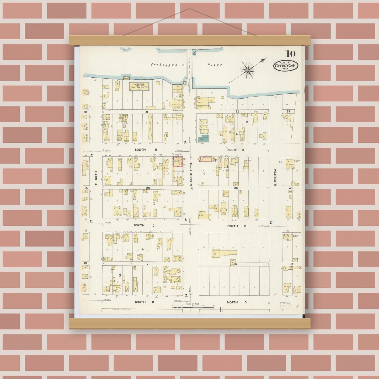 Old map wall art mockup — magnetic wood frame on brick wall — Sanborn Fire Insurance Map from Cheboygan, Cheboygan County, Michigan (1907), Sheet #0010