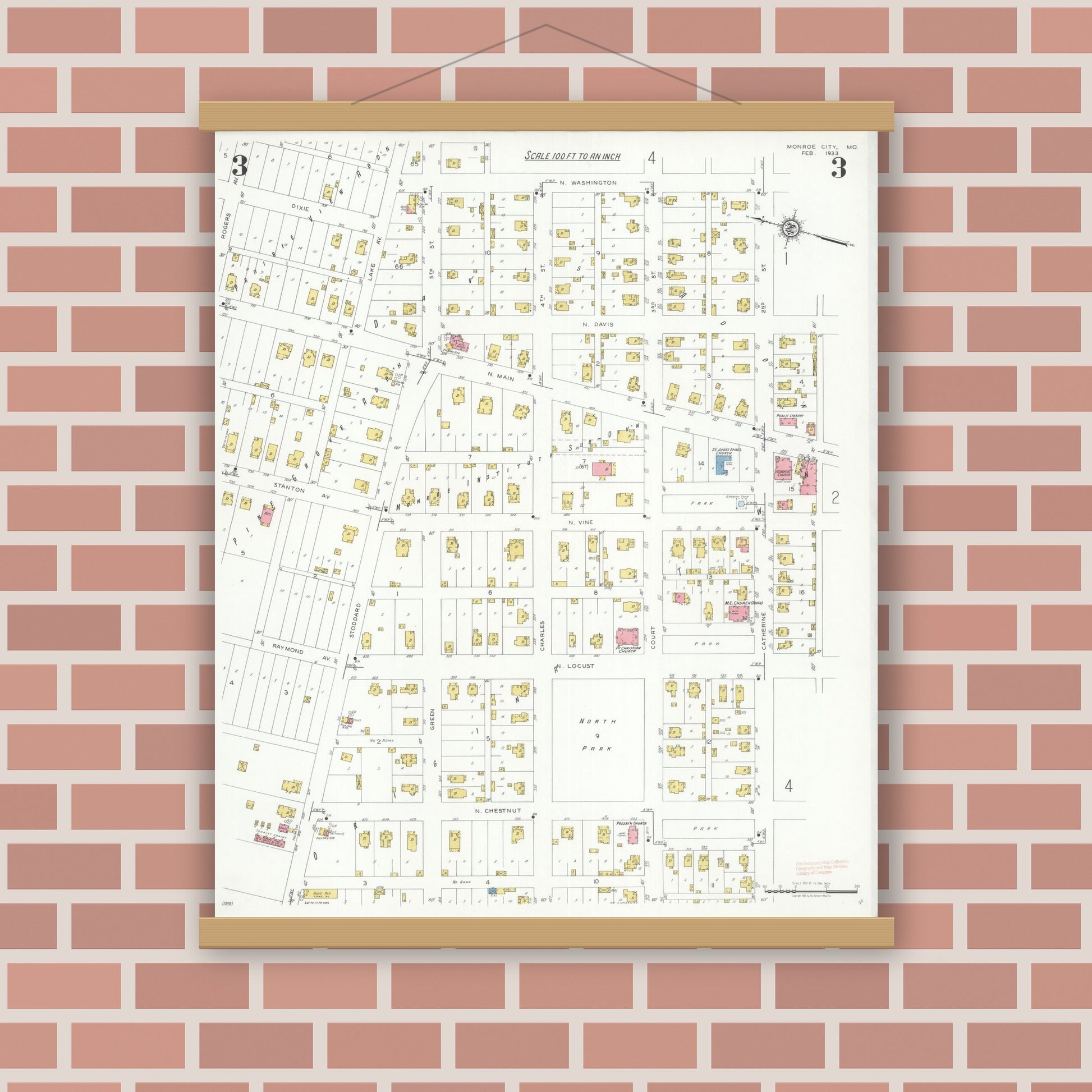 Old map wall art mockup — magnetic wood frame on brick wall — Sanborn Fire Insurance Map from Monroe City, Monroe County, Missouri (1933), Sheet #0003