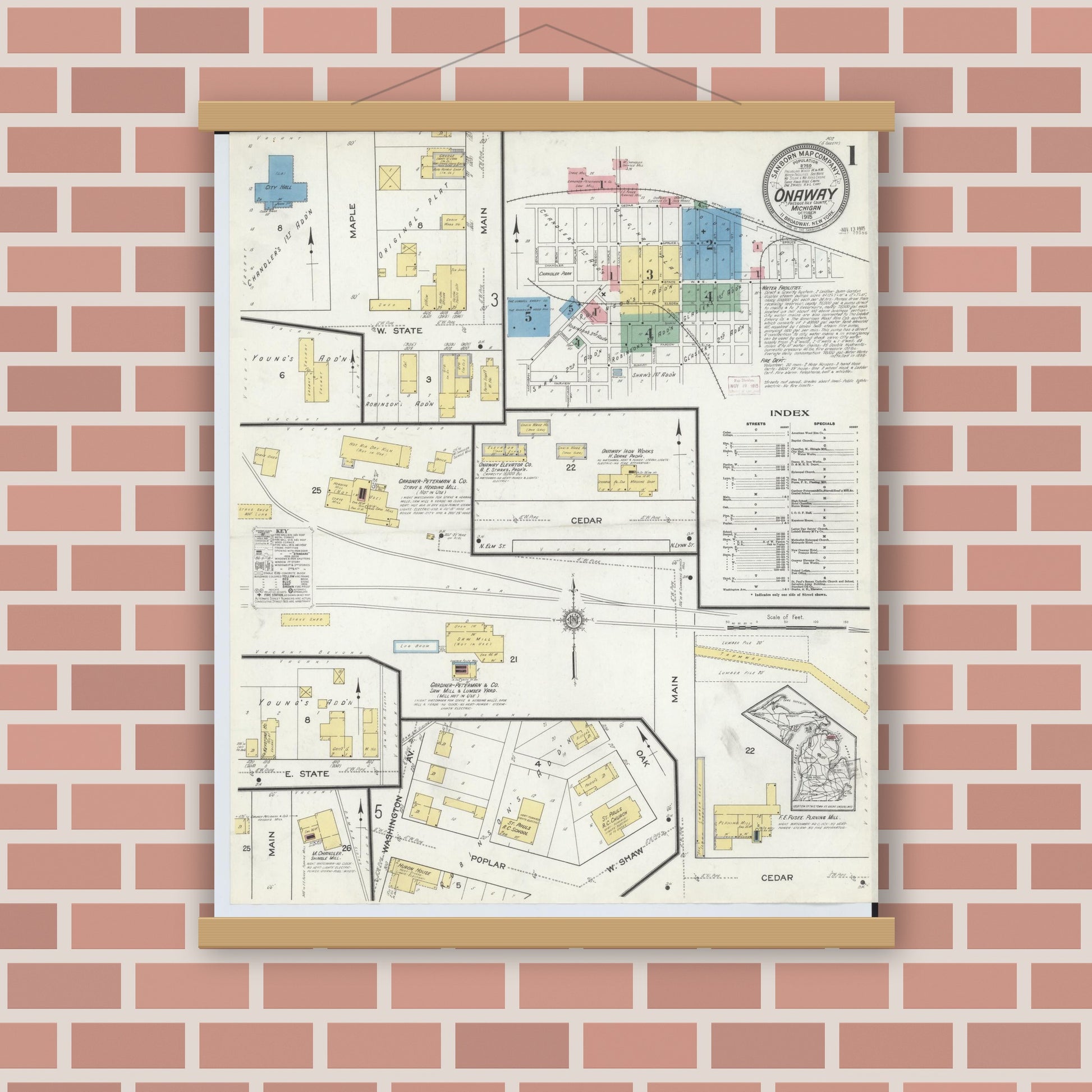 Old map wall art mockup — magnetic wood frame on brick wall — Sanborn Fire Insurance Map from Onaway, Presque Isle County, Michigan (1915), Sheet #0001