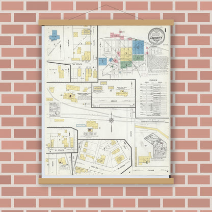 Old map wall art mockup — magnetic wood frame on brick wall — Sanborn Fire Insurance Map from Onaway, Presque Isle County, Michigan (1915), Sheet #0001