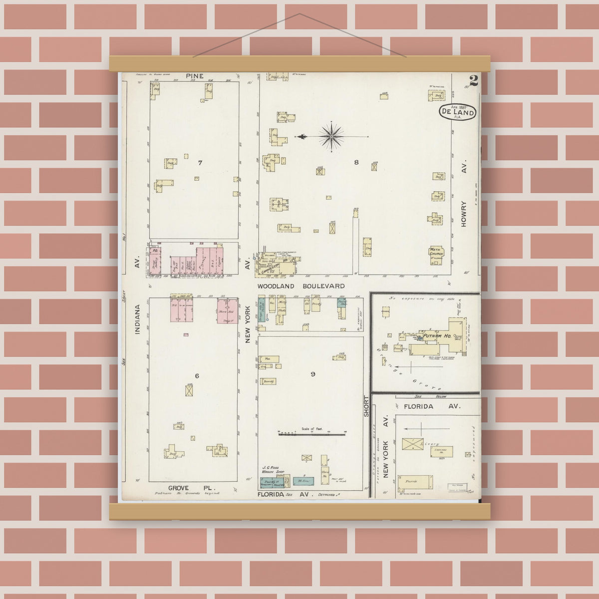 Old map wall art mockup — magnetic wood frame on brick wall — Sanborn Fire Insurance Map from De Land, Volusia County, Florida (1887), Sheet #0002