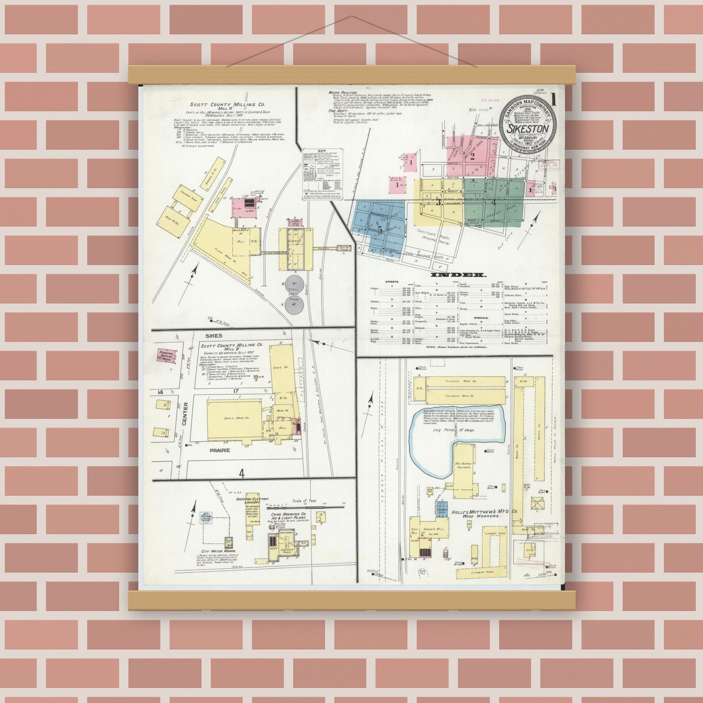 Old map wall art mockup — magnetic wood frame on brick wall — Sanborn Fire Insurance Map from Sikeston, Scott County, Missouri (1910), Sheet #0001