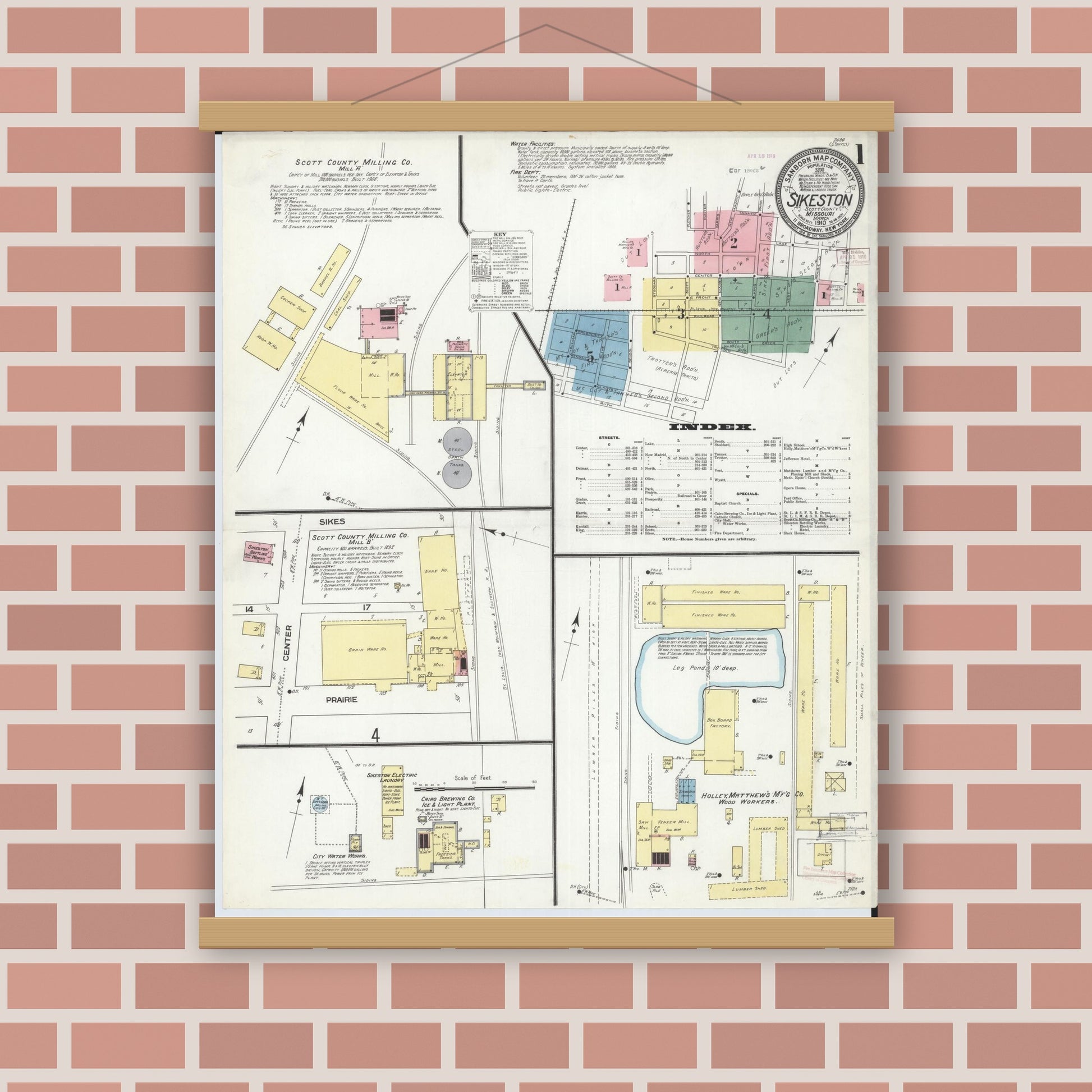 Old map wall art mockup — magnetic wood frame on brick wall — Sanborn Fire Insurance Map from Sikeston, Scott County, Missouri (1910), Sheet #0001