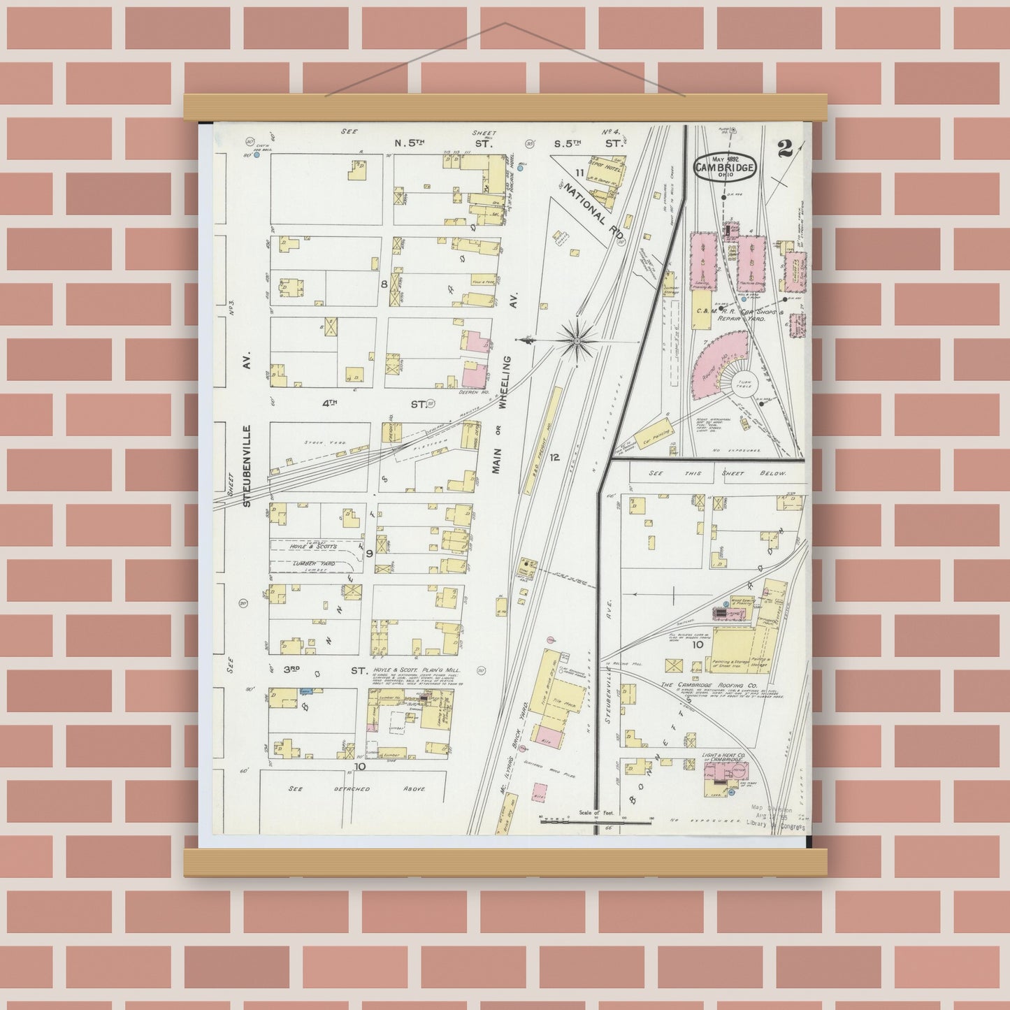 Old map wall art mockup — magnetic wood frame on brick wall — Sanborn Fire Insurance Map from Cambridge, Guernsey County, Ohio (1892), Sheet #0002