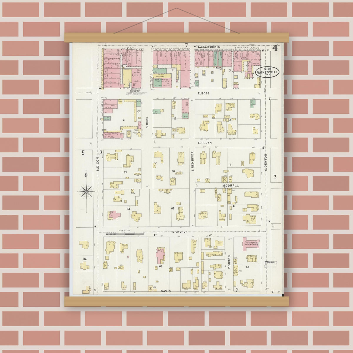 Old map wall art mockup — magnetic wood frame on brick wall — Sanborn Fire Insurance Map from Gainesville, Cooke County, Texas (1897), Sheet #0004