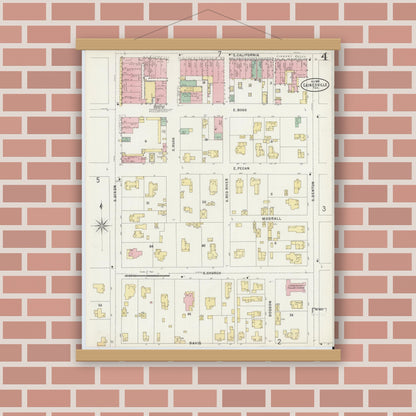 Old map wall art mockup — magnetic wood frame on brick wall — Sanborn Fire Insurance Map from Gainesville, Cooke County, Texas (1897), Sheet #0004
