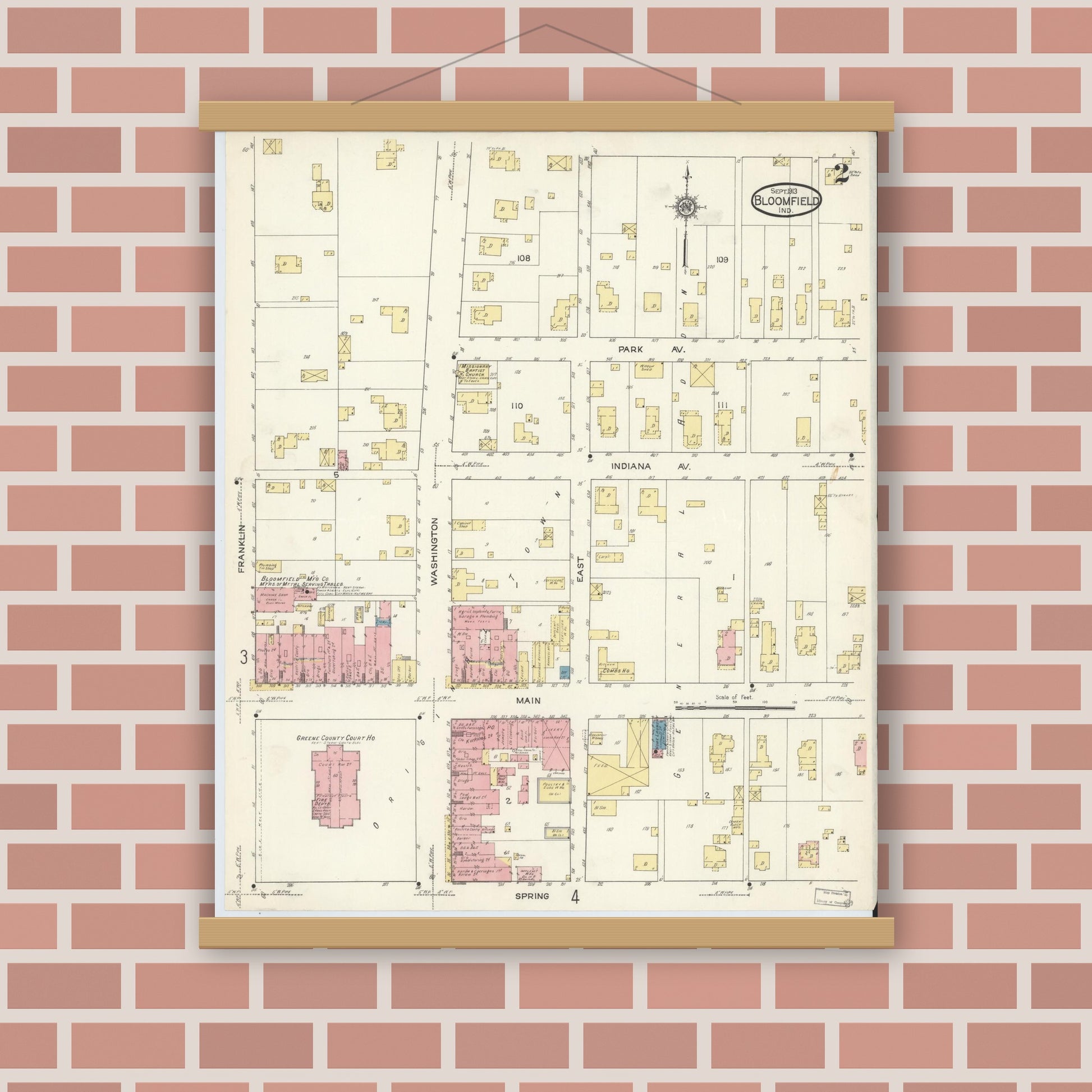 Old map wall art mockup — magnetic wood frame on brick wall — Sanborn Fire Insurance Map from Bloomfield, Greene County, Indiana (1913), Sheet #0002