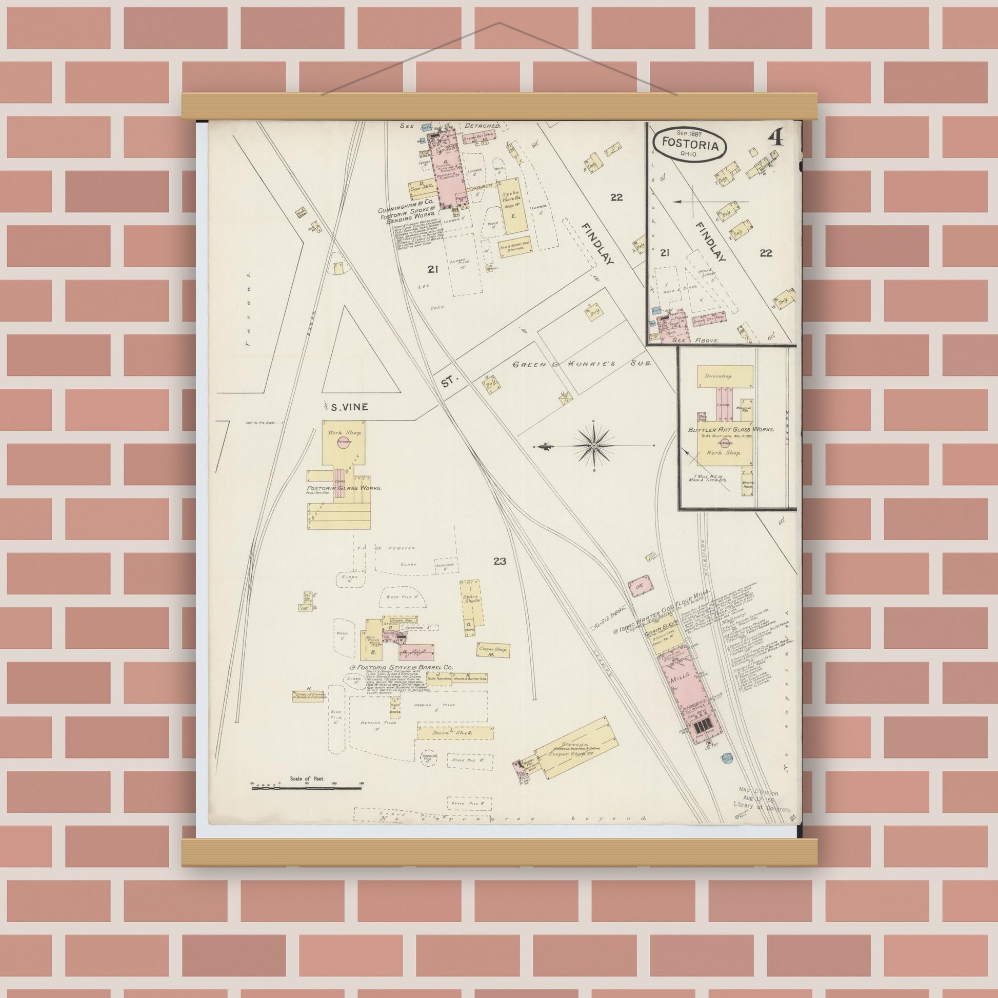 Old map wall art mockup — magnetic wood frame on brick wall — Sanborn Fire Insurance Map from Fostoria, Seneca, Hancock, And Wood Counties, Ohio (1887), Sheet #0004