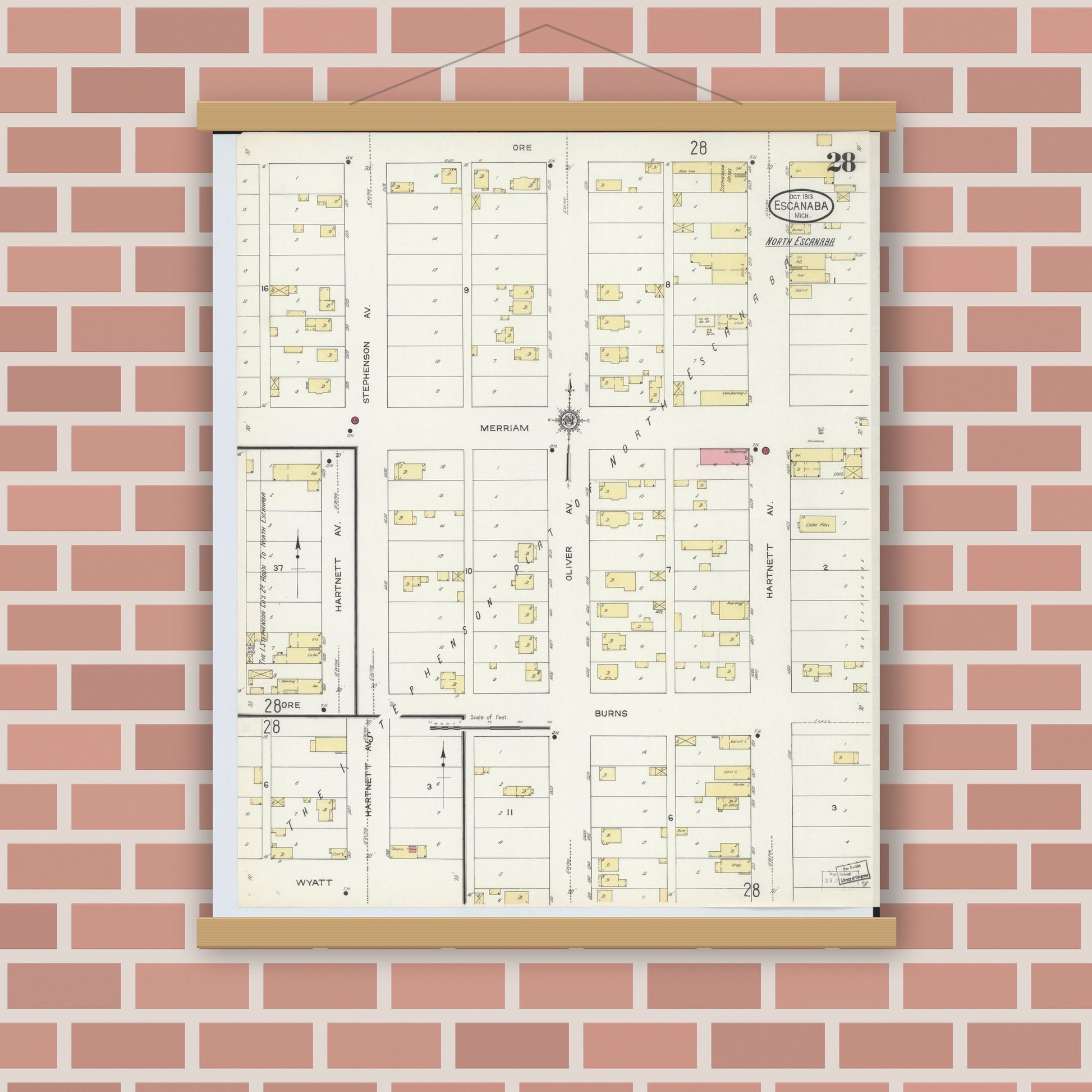 Old map wall art mockup — magnetic wood frame on brick wall — Sanborn Fire Insurance Map from Escanaba, Delta County, Michigan (1913), Sheet #0028