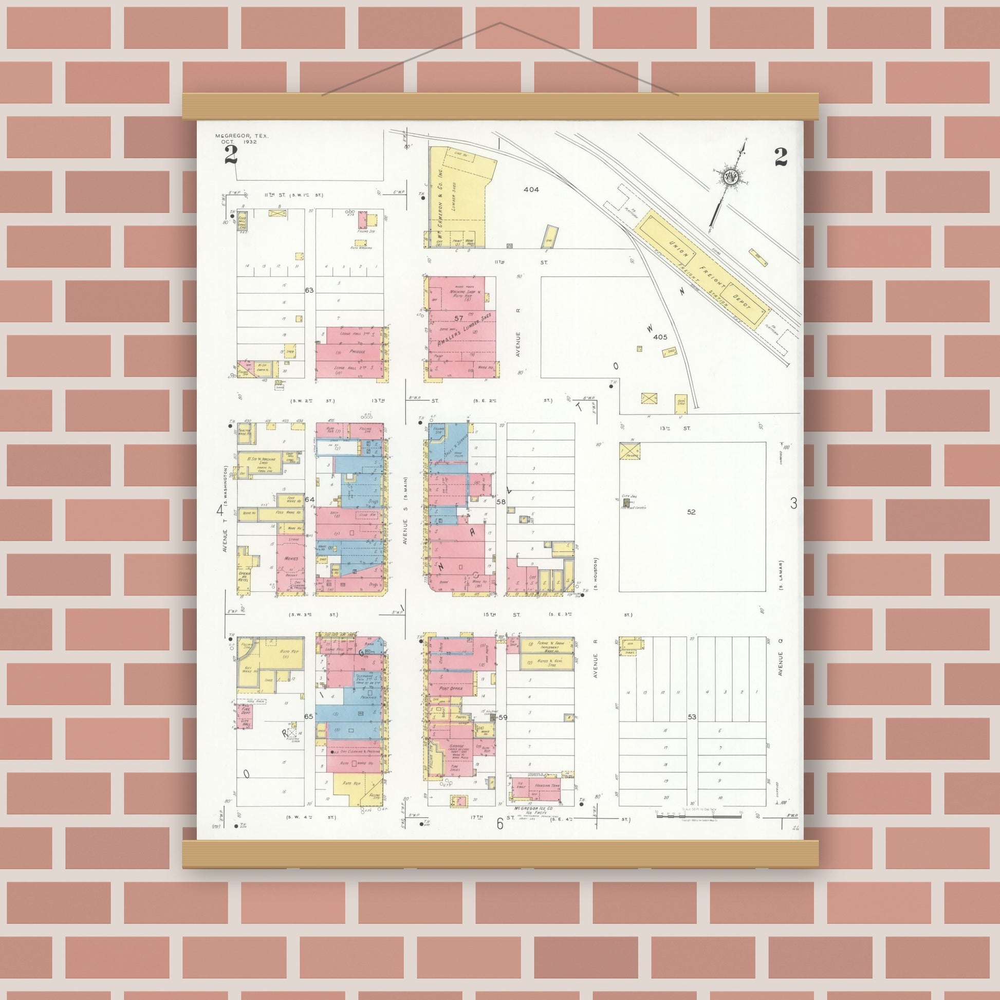 Old map wall art mockup — magnetic wood frame on brick wall — Sanborn Fire Insurance Map from McGregor, McLennan County, Texas (1932), Sheet #0002