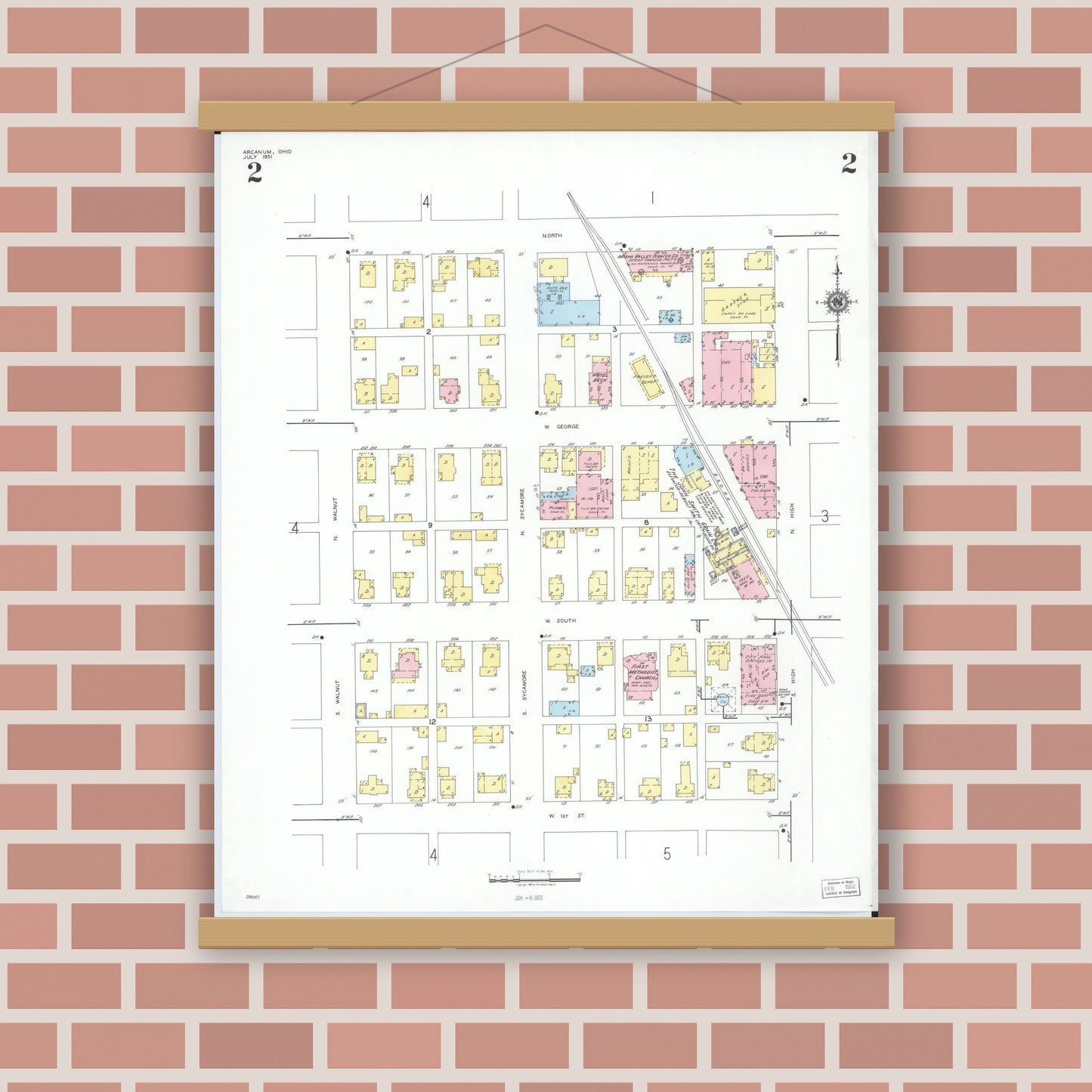 Old map wall art mockup — magnetic wood frame on brick wall — Sanborn Fire Insurance Map from Arcanum, Darke County, Ohio (1951), Sheet #0002