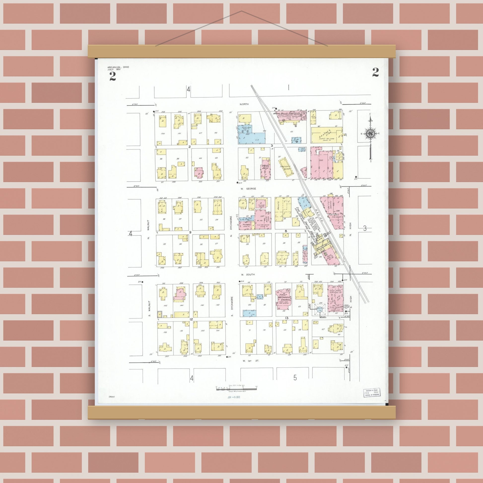 Old map wall art mockup — magnetic wood frame on brick wall — Sanborn Fire Insurance Map from Arcanum, Darke County, Ohio (1951), Sheet #0002