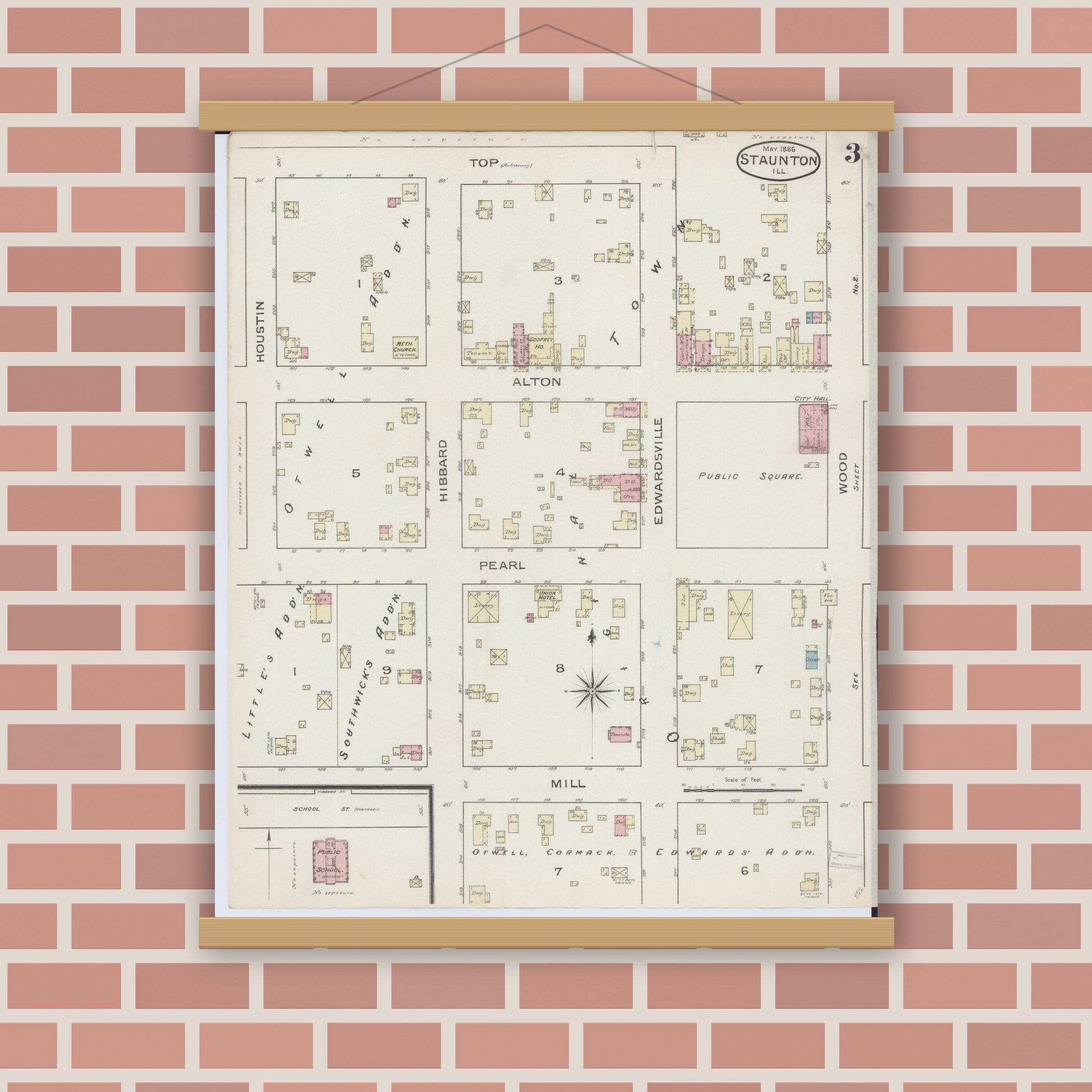 Old map wall art mockup — magnetic wood frame on brick wall — Sanborn Fire Insurance Map from Staunton, Macoupin County, Illinois (1886), Sheet #0003