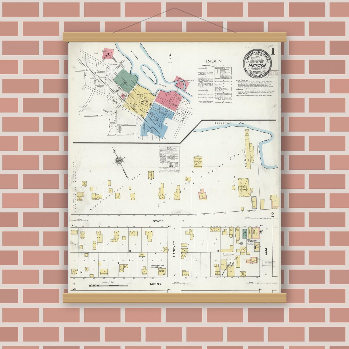 Old map wall art mockup — magnetic wood frame on brick wall — Sanborn Fire Insurance Map from Mauston, Juneau County, Wisconsin (1909), Sheet #0001