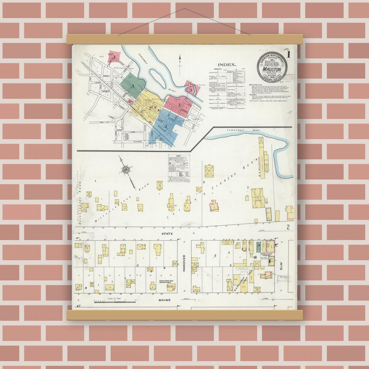 Old map wall art mockup — magnetic wood frame on brick wall — Sanborn Fire Insurance Map from Mauston, Juneau County, Wisconsin (1909), Sheet #0001
