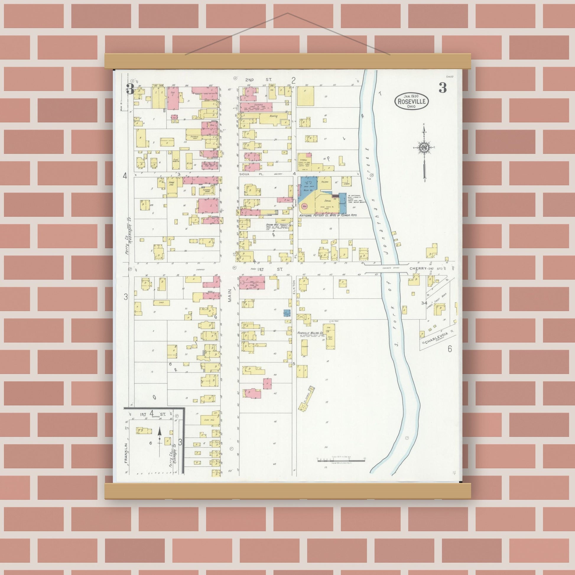 Old map wall art mockup — magnetic wood frame on brick wall — Sanborn Fire Insurance Map from Roseville, Perry And Muskingum Counties, Ohio (1930), Sheet #0003