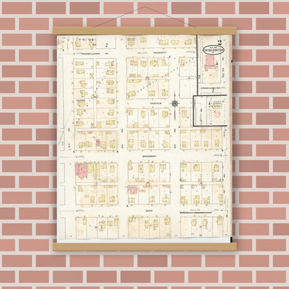 Old map wall art mockup — magnetic wood frame on brick wall — Sanborn Fire Insurance Map from Oxford Junction, Jones County, Iowa (1939), Sheet #0002