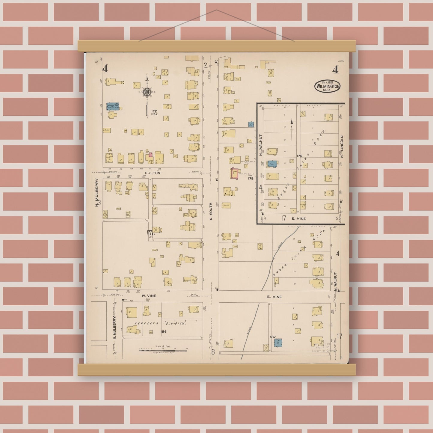 Old map wall art mockup — magnetic wood frame on brick wall — Sanborn Fire Insurance Map from Wilmington, Clinton County, Ohio (1922), Sheet #0004