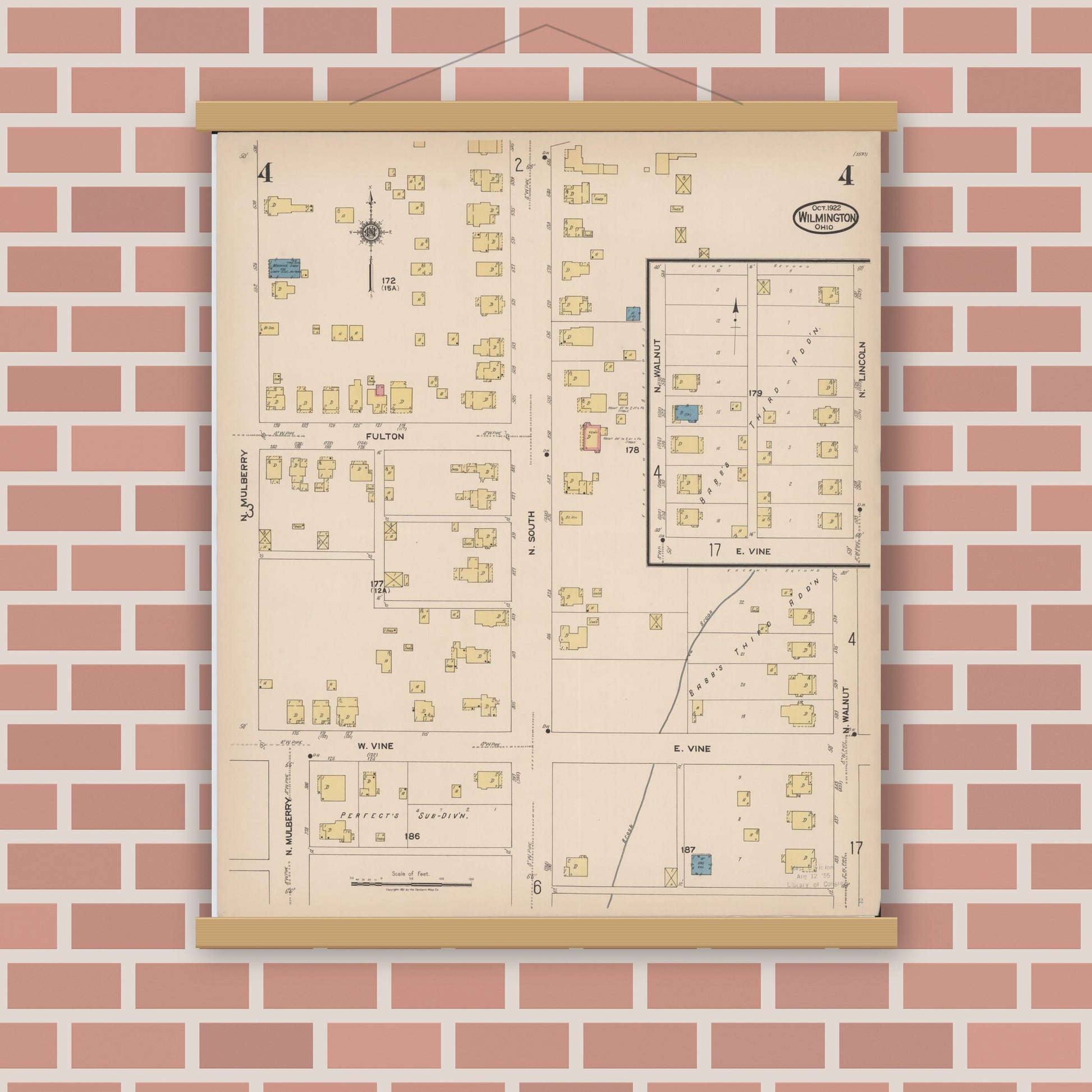 Old map wall art mockup — magnetic wood frame on brick wall — Sanborn Fire Insurance Map from Wilmington, Clinton County, Ohio (1922), Sheet #0004