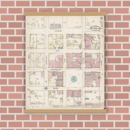 Old map wall art mockup — magnetic wood frame on brick wall — Sanborn Fire Insurance Map from Gainesville, Cooke County, Texas (1885), Sheet #0003