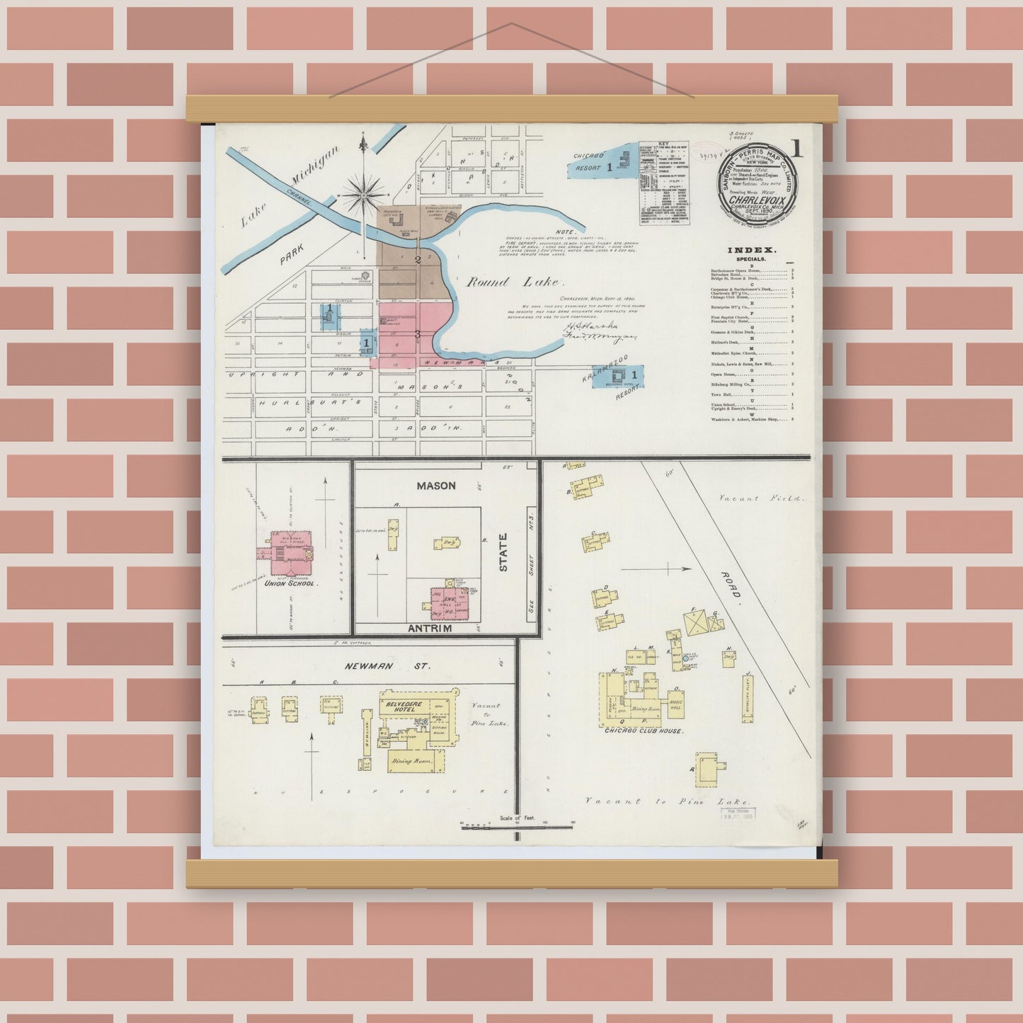 Old map wall art mockup — magnetic wood frame on brick wall — Sanborn Fire Insurance Map from Charlevoix, Charlevoix County, Michigan (1890), Sheet #0001