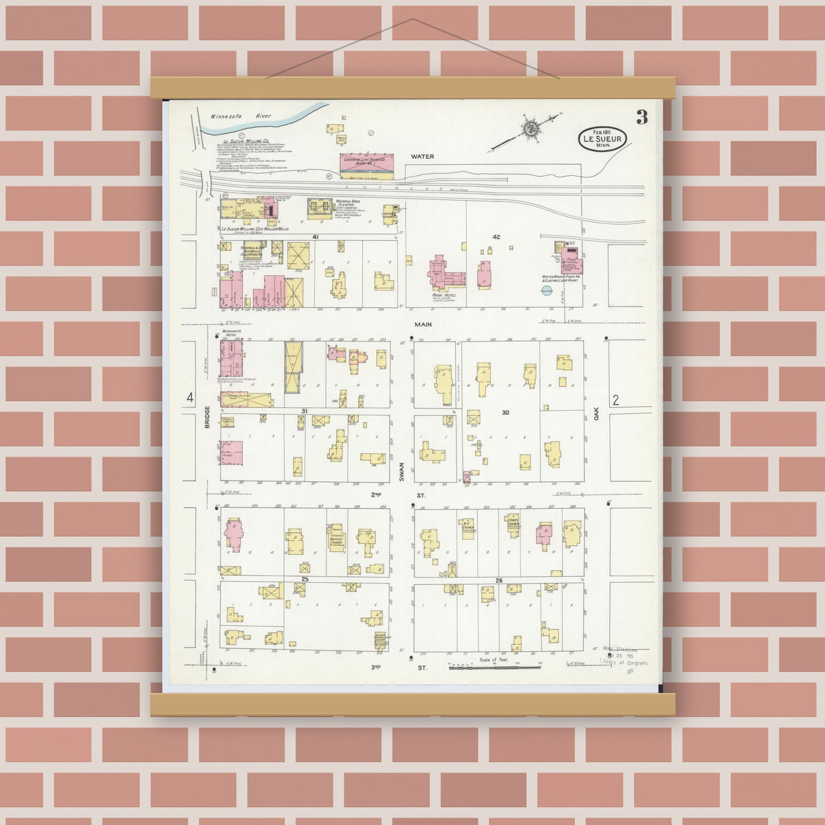Old map wall art mockup — magnetic wood frame on brick wall — Sanborn Fire Insurance Map from Le Sueur, Le Sueur County, Minnesota (1911), Sheet #0003