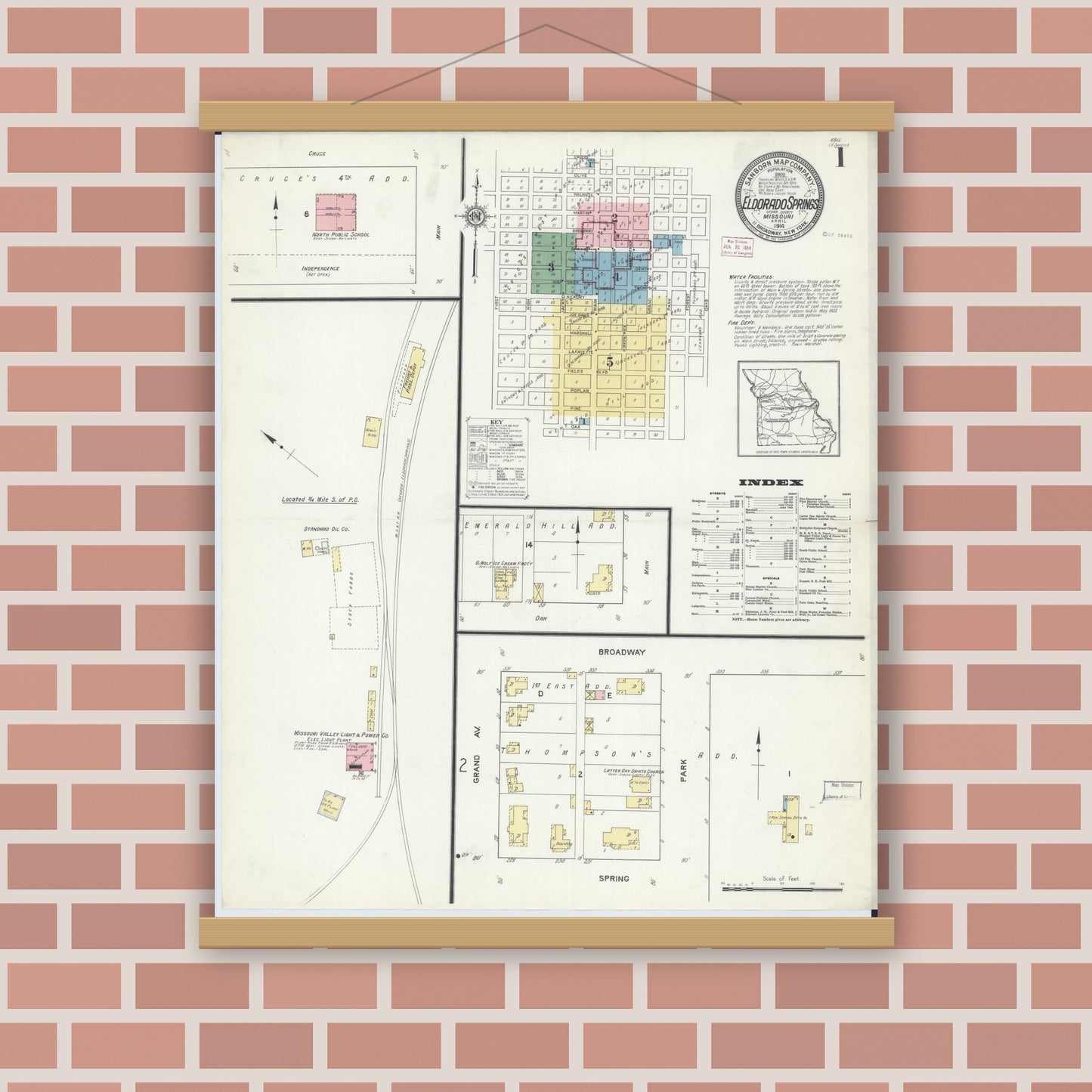 Old map wall art mockup — magnetic wood frame on brick wall — Sanborn Fire Insurance Map from Eldorado Springs, Cedar County, Missouri (1914) - Complete Map Set