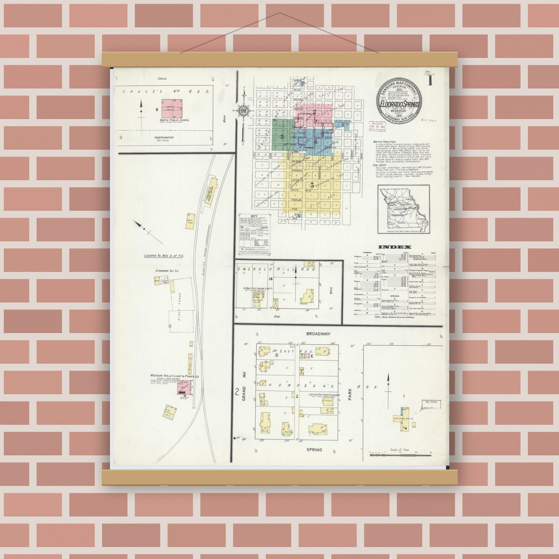 Old map wall art mockup — magnetic wood frame on brick wall — Sanborn Fire Insurance Map from Eldorado Springs, Cedar County, Missouri (1914) - Complete Map Set