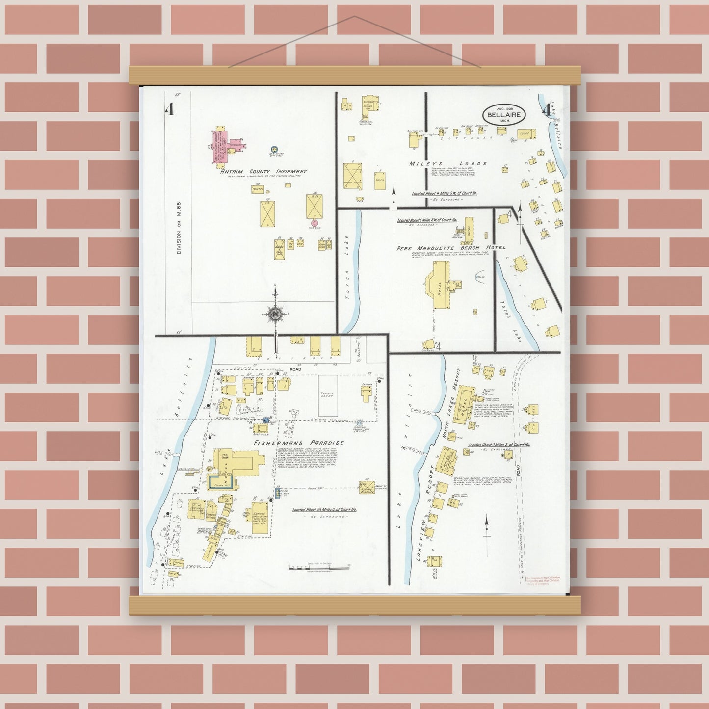 Old map wall art mockup — magnetic wood frame on brick wall — Sanborn Fire Insurance Map from Bellaire, Antrim County, Michigan (1929), Sheet #0004