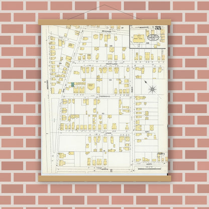 Old map wall art mockup — magnetic wood frame on brick wall — Sanborn Fire Insurance Map from Everett, Middlesex County, Massachusetts (1903), Sheet #0033