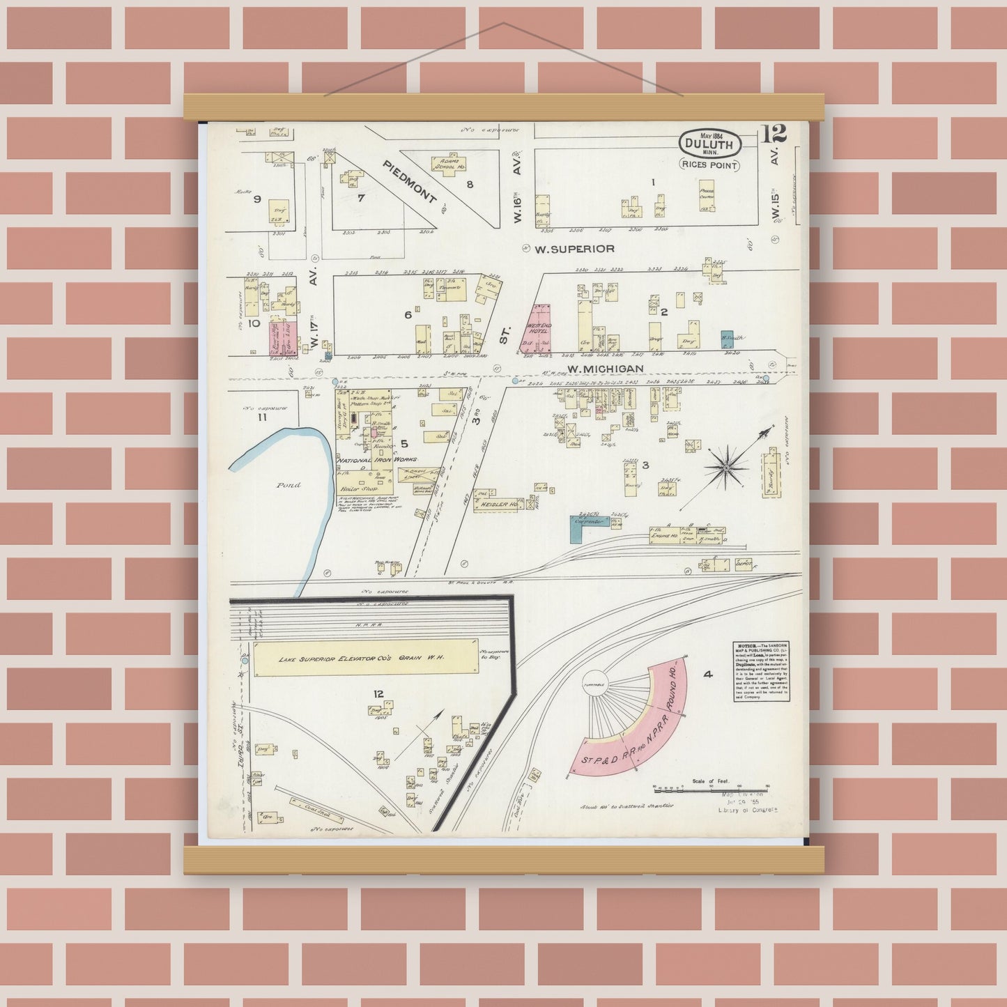 Old map wall art mockup — magnetic wood frame on brick wall — Sanborn Fire Insurance Map from Duluth, Saint Louis County, Minnesota (1884), Sheet #0012