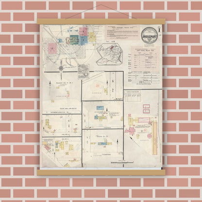 Old map wall art mockup — magnetic wood frame on brick wall — Sanborn Fire Insurance Map from Bridgeport, Wise County, Texas (1944), Sheet #0001