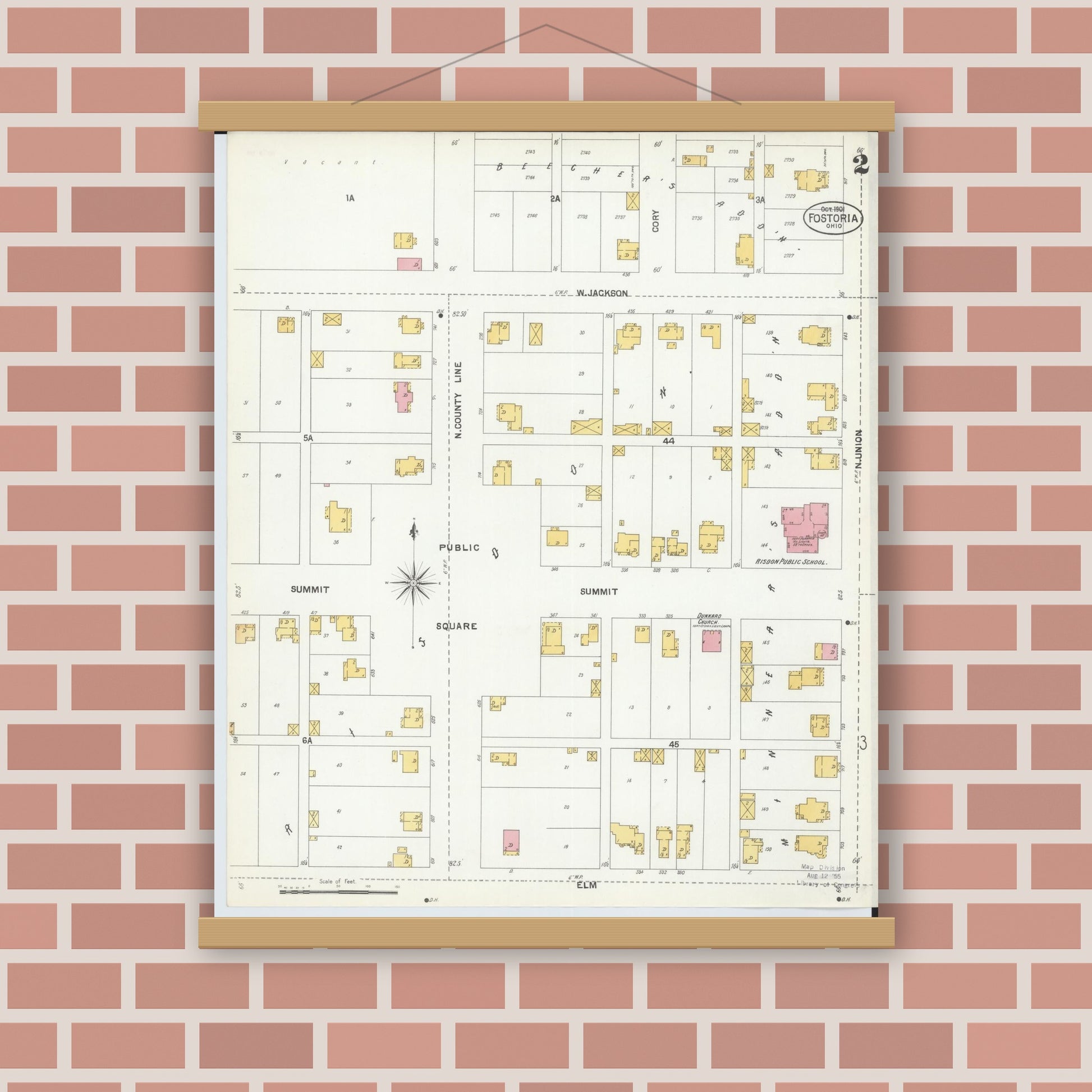 Old map wall art mockup — magnetic wood frame on brick wall — Sanborn Fire Insurance Map from Fostoria, Seneca, Hancock, And Wood Counties, Ohio (1901), Sheet #0002