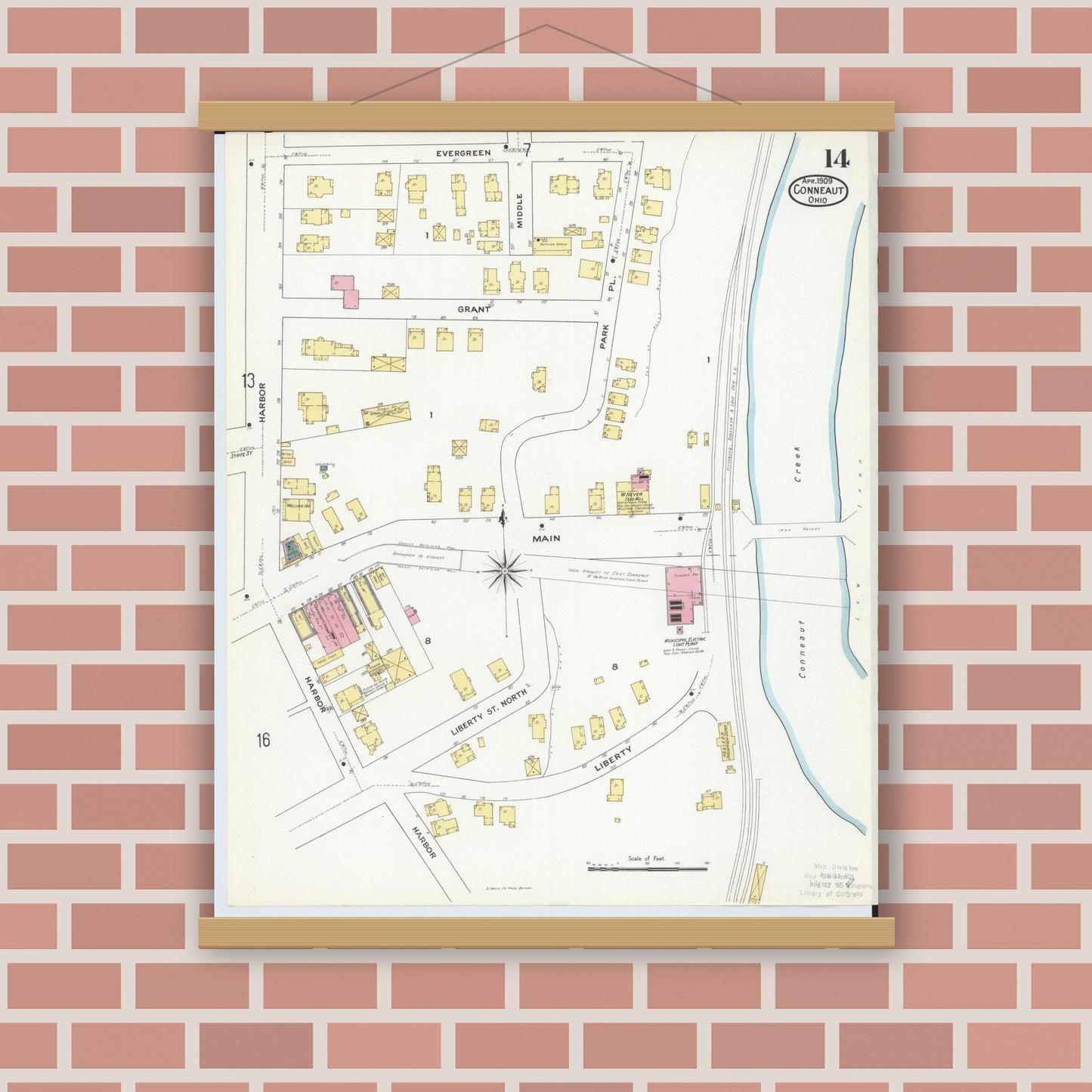 Old map wall art mockup — magnetic wood frame on brick wall — Sanborn Fire Insurance Map from Conneaut, Ashtabula County, Ohio (1909), Sheet #0014