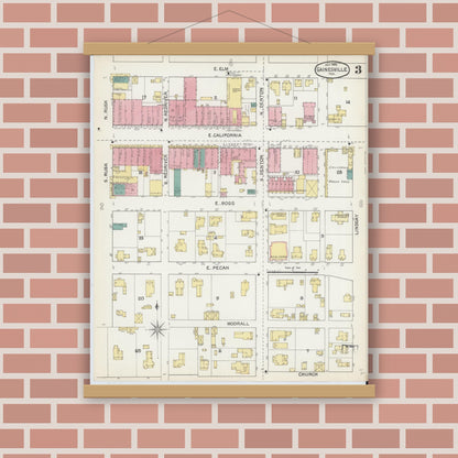 Old map wall art mockup — magnetic wood frame on brick wall — Sanborn Fire Insurance Map from Gainesville, Cooke County, Texas (1892), Sheet #0003